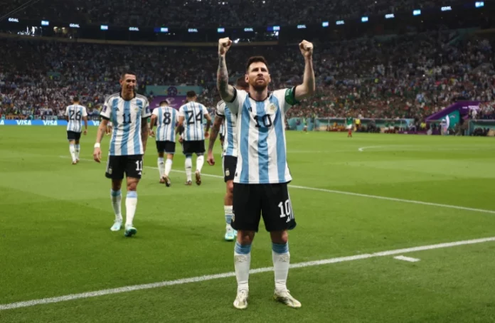 Argentina’s Lionel Messi celebrates scoring his team’s first goal against Mexico [File: Pedro Nunes/Reuters]