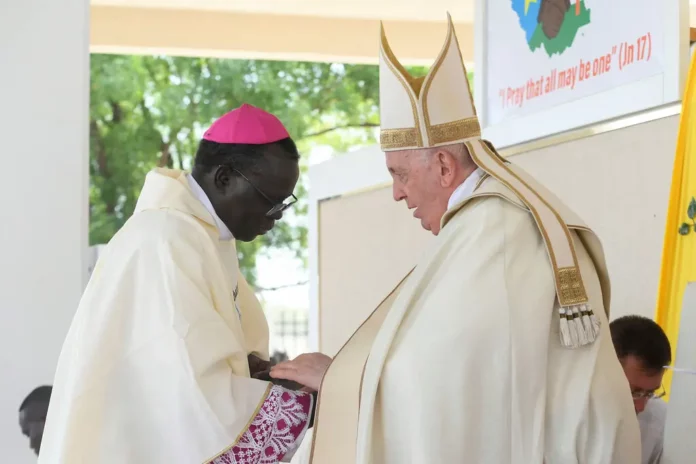 A photograph provided by the Vatican of the archbishop of Juba, Stephen Ameyu Martin Mulla, with Pope Francis on Sunday during a Mass in Juba.Credit...Vatican Media/via Reuters