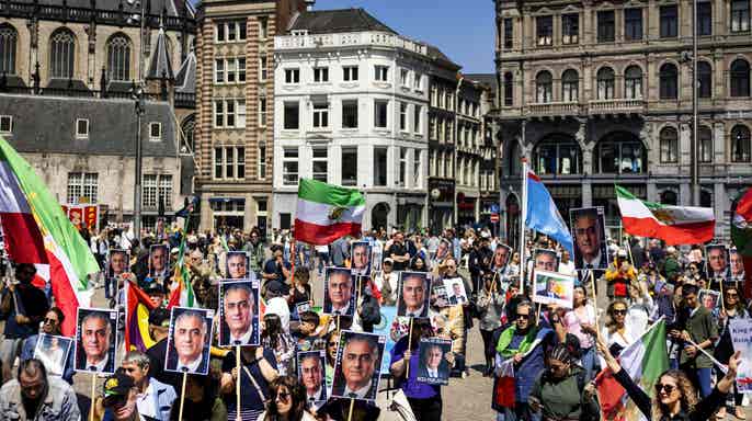 Protesters take part in a demonstration calling for more rights in Iran, on Dam Square in Amsterdam, on May 20, 2023. A spokesman for the Netherlands General and Intelligence Security Service said the Netherlands is reportedly concerned about Iran "taking down hurdles related to the production of fissile material that could be used in a nuclear weapon." (Ramon van Flymen/ANP/AFP via Getty Images)