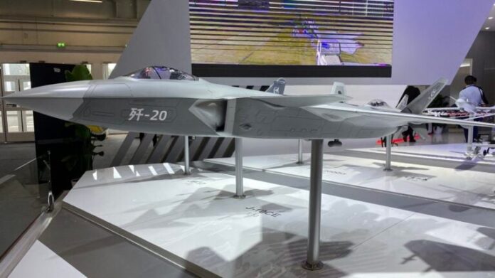 A model of the Chengdu J-20, produced by China’s AVIC, is seen at the 2023 Paris Air Show. Chinese military firms had a sizeable presence on the show floor. (Aaron Mehta/Breaking Defense)