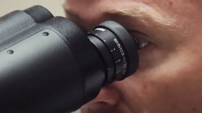 Dr. Niels Olson uses the Augmented Reality Microscope. U.S. Department of Defense