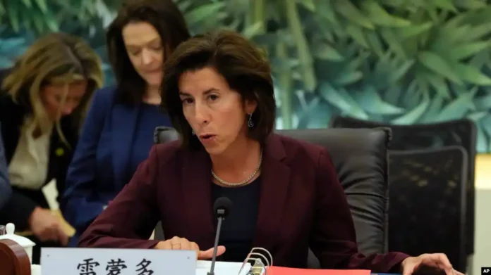 FILE - U.S. Commerce Secretary Gina Raimondo speaks during a meeting with her Chinese counterpart Wang Wentao, unseen, at the Ministry of Commerce in Beijing, Aug. 28, 2023.