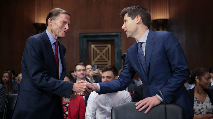 Sam Altman, CEO of OpenAI, greets committee chairman Sen. Richard Blumenthal (D-CT) while arriving for testimony before the Senate Judiciary Subcommittee on Privacy, Technology, and the Law May 16, 2023 in Washington, DC. At the hearing, Altman calle (Win McNamee/Getty Images / Getty Images)