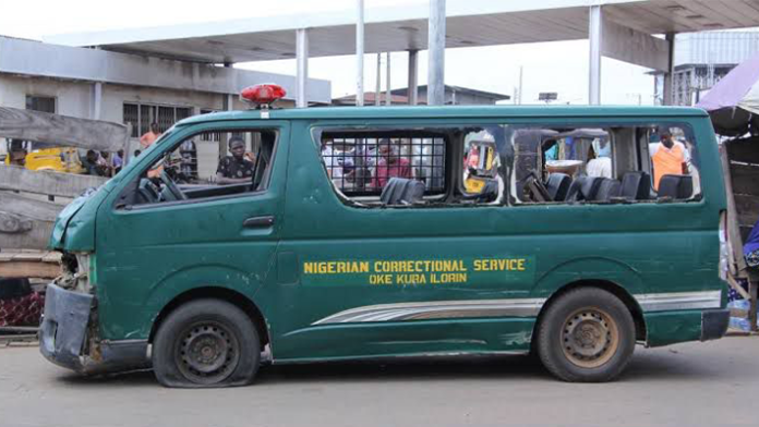 NCoS vehicle coveying inmates[Credit: Afrika Eyes]