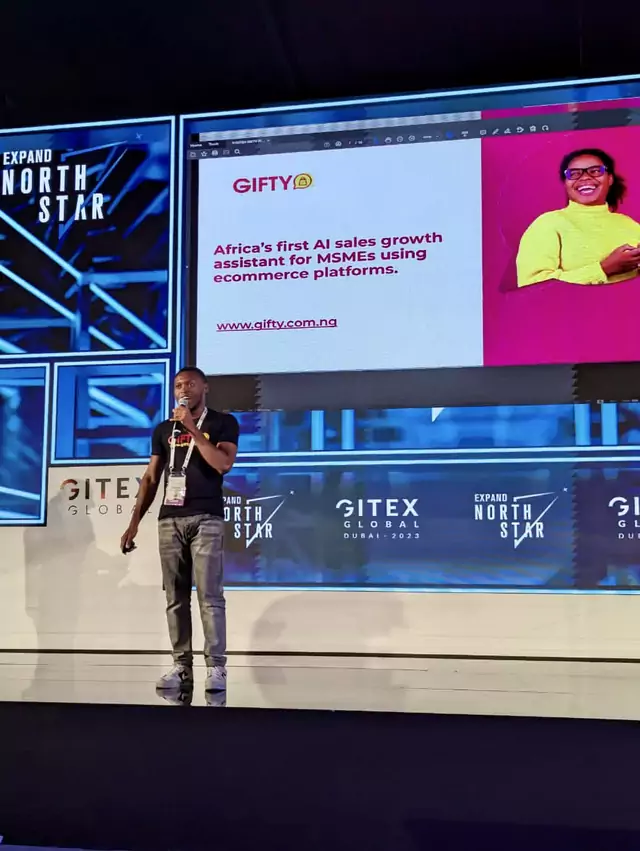 Victor D. Akpan, CEO of GIFTY AI, delivering his compelling pitch at Expand North Star, GITEX 2023. Source: Twitter - @ONDINigeria