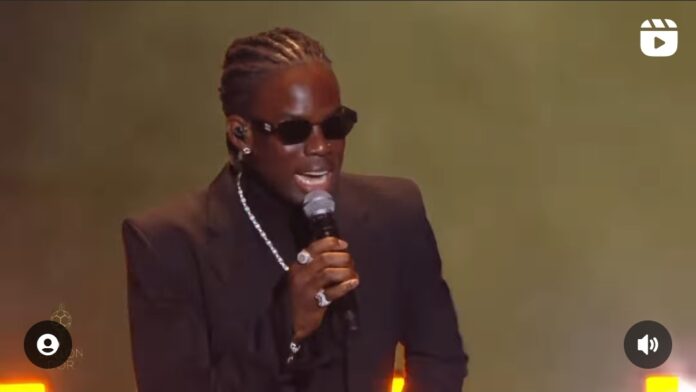 Rema performing his hit song 'Calm Down' at the 2023 Ballon d’Or