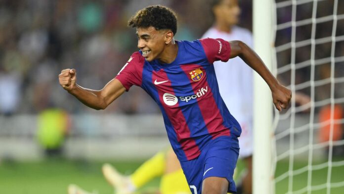 Barcelona's Spanish forward #27 Lamine Yamal celebrates scoring a goal during the Spanish Liga football match between FC Barcelona and Sevilla FC at the Estadi Olimpic Lluis Companys in Barcelona Image credit: Getty Images