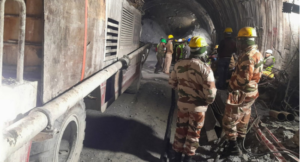 Rescue workers gather at the site after a tunnel collapsed in the Uttarkashi district of India’s Uttarakhand state on November 13, 2023. Rescue workers in northern India said on November 13 they had made contact with 40 workers trapped for over 24 hours after the road tunnel they were building collapsed. (Photo by AFP)