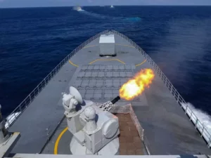 A Type 055-class cruiser firing its close-in weapon system at mock targets during a drill in May.eng.chinamil.com.cn/Photo by Yang Yunxiang