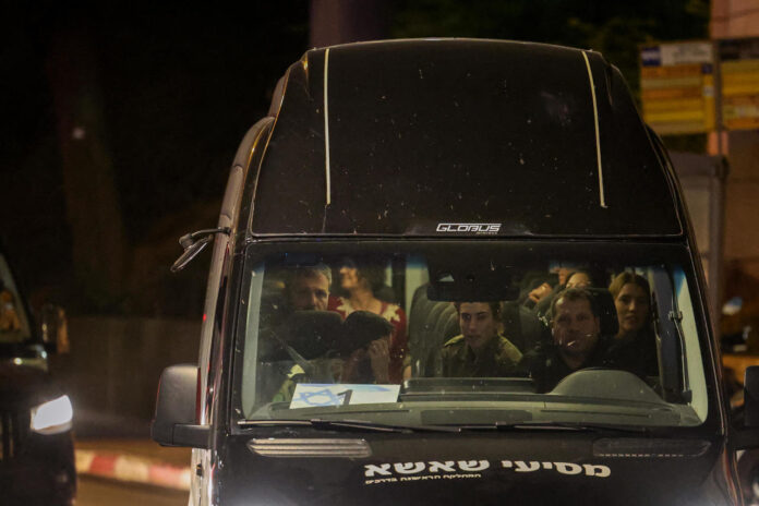 A convoy carrying freed Israeli hostages released by Hamas from the Gaza Strip arrives at the Sheba Medical Center in Ramat Gan, Israel, on Nov. 26, 2023. They were the second group of Israeli and foreign hostages released by Hamas since the cease-fire began in the Israel-Hamas war. JACK GUEZ/AFP VIA GETTY IMAGES
