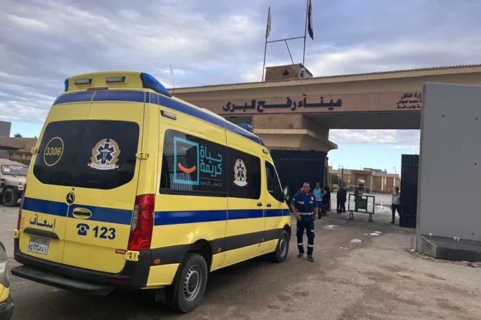 An Egyptian ambulance prepares to enter the Gaza Strip on Nov. 15 through the Rafah crossing, to transport critically wounded Palestinians for treatment to Egypt. Aya Batrawy/NPR