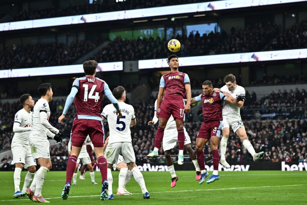 Aston Villa’s English striker #11 Ollie Watkins heads the ball during the English Premier League football match between Tottenham Hotspur and Aston Villa at Tottenham Hotspur Stadium in London, on November 26, 2023. (Photo by Ben Stansall / AFP)