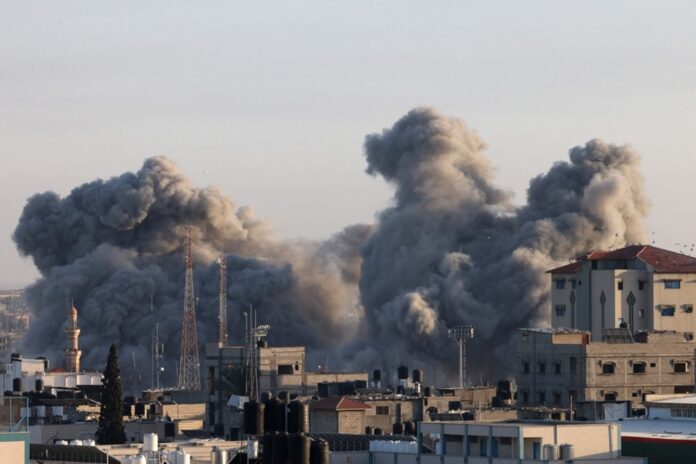 Smoke billows following an Israeli strike in Rafah in the southern Gaza Strip on November 6, 2023, amid ongoing battles between Israel and the Palestinian Hamas movement. (AFP)
