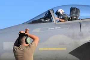 A US Air Force crew chief marshaling a US F-15C during Exercise Pitch Black at the Australian-air-force base in Darwin in August 2022.US Air Force/Staff Sgt. Savannah Waters