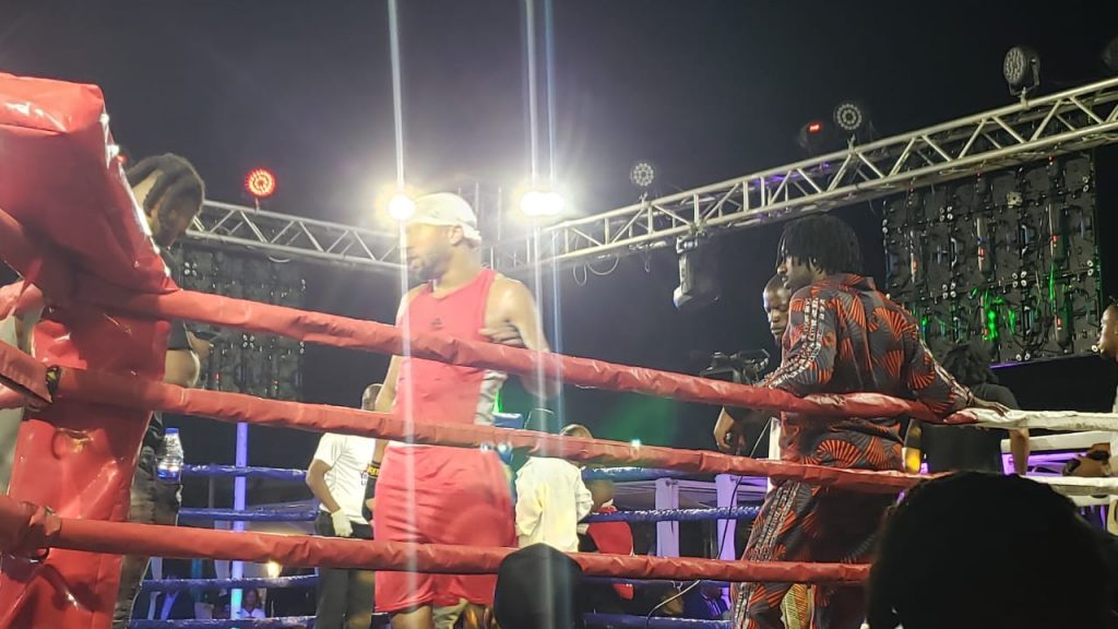 Okocha warming up for the fight.