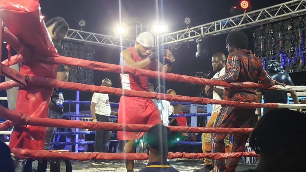 Okocha warming up for the fight.
