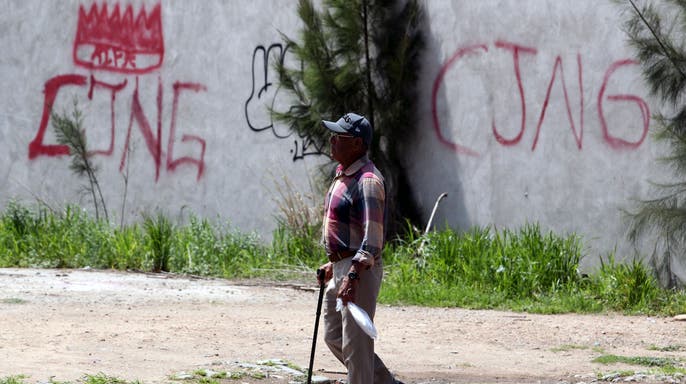 The initials of the drug cartel "Jalisco Nueva Generacion" (CJNG) are seen in graffiti on a wall in Lagos de Moreno, Jalisco State, Mexico, on Aug. 29, 2023. (Ulises Ruiz/AFP via Getty Images)