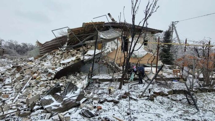 In this photo provided by the Ukrainian Emergency Service a view of private residential houses damaged in a Russian missile attack, near Kryvyi Rih, Ukraine, Monday, Jan. 8, 2024. (Ukrainian Emergency Service via AP)