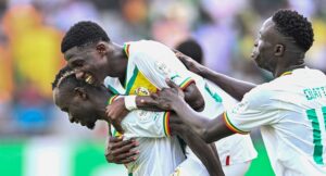 Senegal’s midfielder #25 Lamine Camara (C) celebrates with teammates after scoring his team’s third goal during the Africa Cup of Nations (CAN) 2024 group C football match between Senegal and Gambia at Stade Charles Konan Banny in Yamoussoukro on January 15, 2024. (Photo by Issouf SANOGO / AFP)