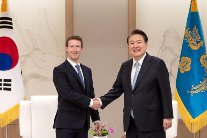 This handout photo taken on February 29, 2024 and released by South Korean Presidential Office via Yonhap shows South Korean President Yoon Suk Yeol (R) shaking hands with Mark Zuckerberg (L), head of US tech giant Meta, during their meeting at Yoon's office in Seoul. Photo by Handout / South Korean Presidential Office / AFP