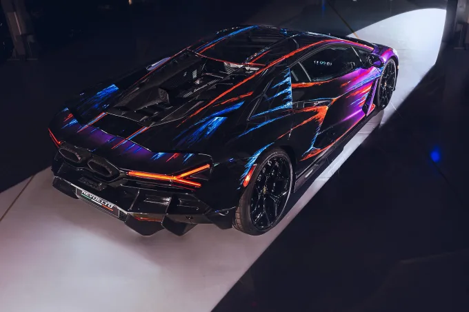 The Lamborghini Revuelto Opera Unica, a Lamborghini Revuelto plug-in hybrid supercar with a special hand-applied paint job that took 435 hours to complete, according to the automaker.  Courtesy Lamborghini
