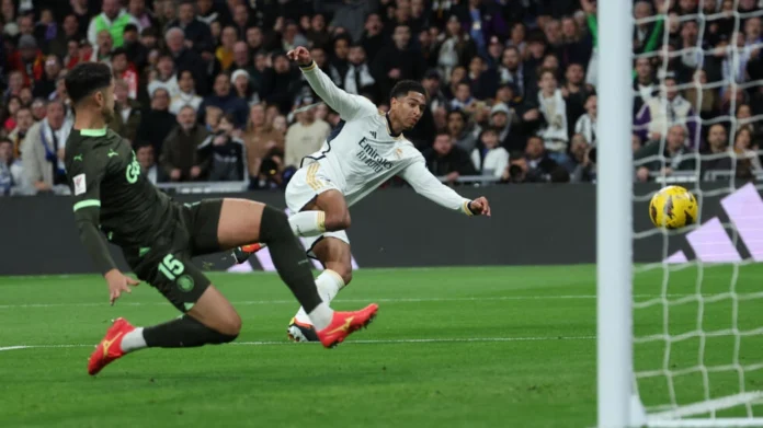 Real Madrid midfielder Jude Bellingham struck twice to fire his side to a convincing victory over title rivals Girona on Saturday © Pierre-Philippe MARCOU / AFP