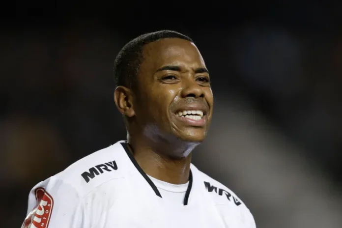 Robinho ose to national fame in 2002 as an 18-year-old who led Santos to its first national title since the football great Pele's era [File: Victor R Caivano/AP]