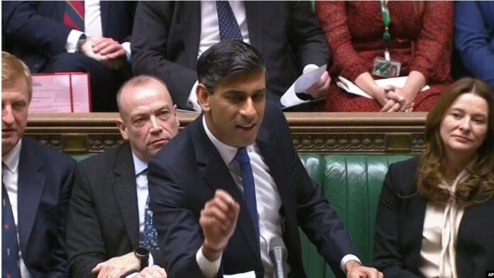 In this photo issued by UK Parliament, Britain's Prime Minister Rishi Sunak speaks during Prime Minister's Questions in the House of Commons, London, Jan. 17, 2024.