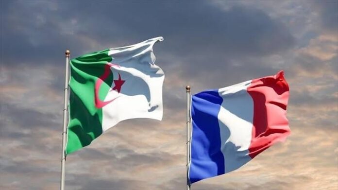 FILE - Flag of Algeria and France