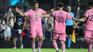 Luis Suarez and Lionel Messi celebrate after scoring a goal for Miami against Nashville in the Concacaf Champions Cup.