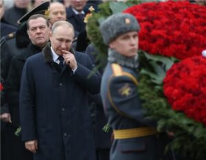 Russian President Vladimir Putin (C) and Security Council Deputy Chairman Dmitry Medvedev (L) seen during the wreath-laying ceremony to the Tomb of Unknown Soldier in front of the Kremlin on February 23, 2020 in Moscow, Russia.Mikhail Svetlov/Getty Images