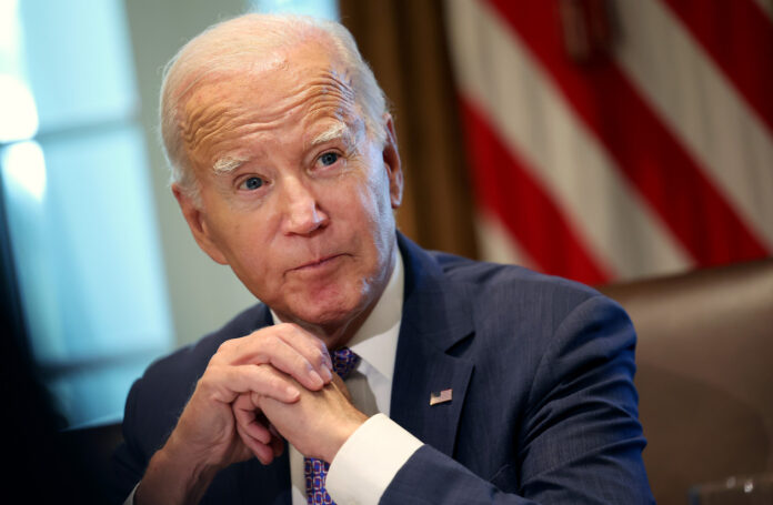 One former senior Biden official cautioned that Biden deciding to personally insert himself would only further politicize the situation. | Kevin Dietsch/Getty Images