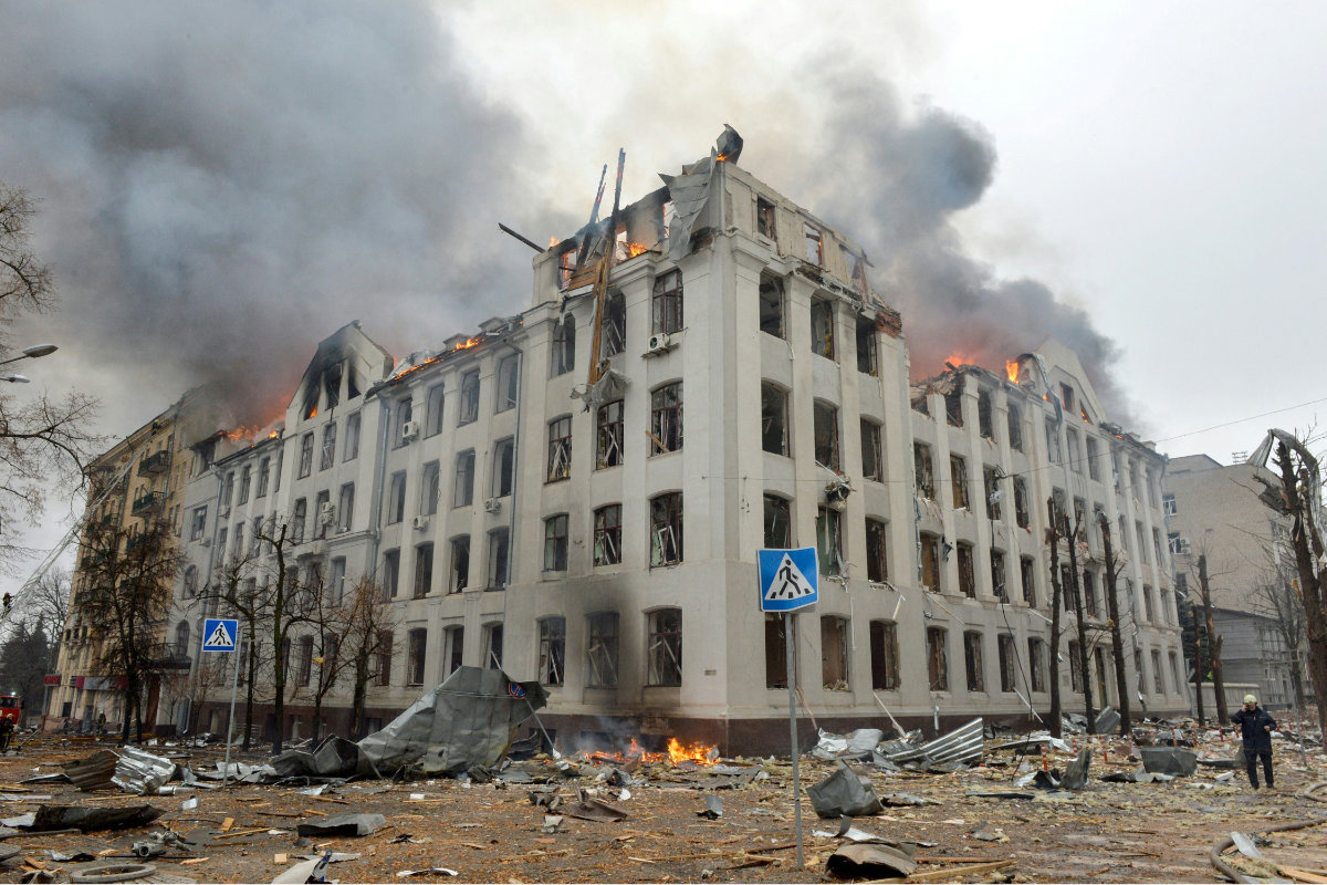 Ukrainian firefighters work to contain a fire at the Economy Department building of Karazin Kharkiv National University, hit during recent Russian shelling. (AFP/File)