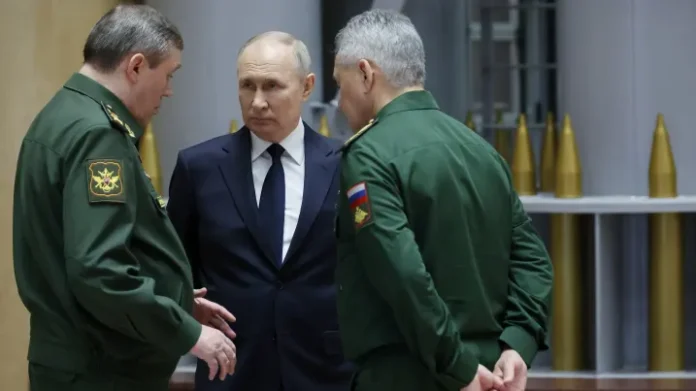 Russian President Vladimir Putin, accompanied by Chief of the General Staff of the Russian Armed Forces - First Deputy Defence Minister Valery Gerasimov and Russian Defence Minister Sergei Shoigu, tours an exhibition of cutting-edge pieces of armament following an expanded meeting of the Defence Ministry Board at the National Defence Control Centre in Moscow, Russia December 19, 2023. Sputnik/Mikhail Klimentyev/Kremlin via REUTERS ATTENTION EDITORS - THIS IMAGE WAS PROVIDED BY A THIRD PARTY. Mikhail Klimentyev | Sputnik | Reuters