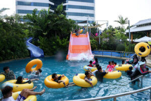 People cool off at a water park in Bangkok, Thailand, on May 1, 2024, on a hot weather day as Thai authorities said that people were dying from heat stroke this year and warned to avoid outdoor activities. (REUTERS)
