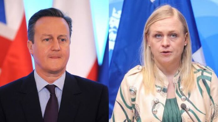 Britain's Foreign Secretary David Cameron (L) and Finnish Foreign Minister Elina Valtonen. 