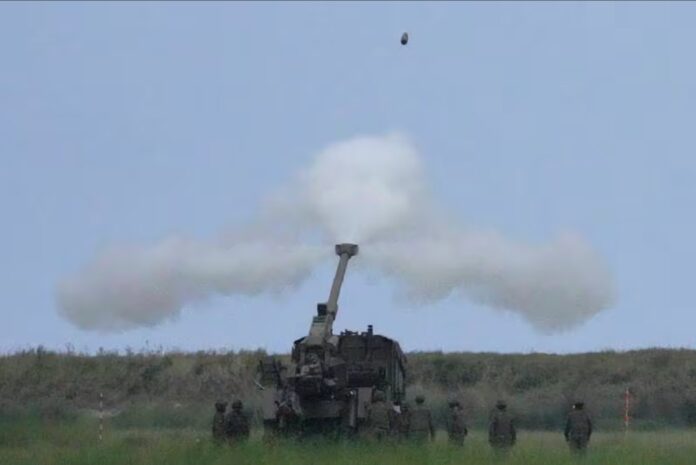 Thousands of American and Filipino forces hit a ship with a barrage of high-precision rockets, airstrikes and artillery fire in their largest war drills in Philippine waters facing the disputed South China Sea that would likely antagonize China. (AP Photo/Aaron Favila)