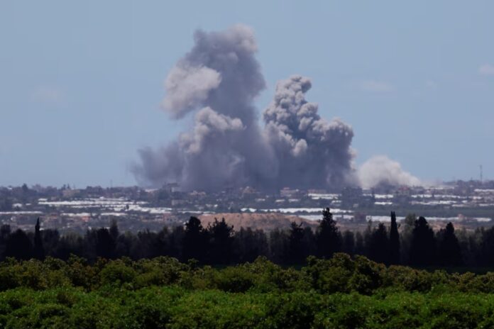 Smoke rises over Gaza following an explosion, amid the ongoing conflict between Israel and the Palestinian Islamist group Hamas, as seen from Israel, May 6, 2024. REUTERS/Ammar Awad