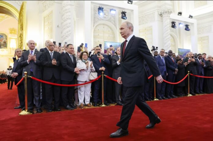 Russian President Vladimir Putin walks before his inauguration ceremony at the Kremlin in Moscow, Russia May 7, 2024. Sputnik/Artyom Geodakyan/Pool via REUTERS
