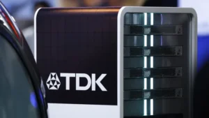 The TDK Corp. logo displayed on the company’s industrial standard battery unit at the Combined Exhibition of Advanced Technologies (Ceatec) in Chiba, Japan, on Tuesday, Oct. 17, 2023.  Bloomberg | Bloomberg | Getty Images