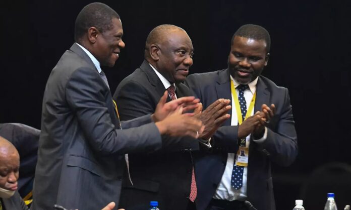 President of the African National Congress (ANC) Cyril Ramaphosa (C) celebrates with Deputy president of the African National Congress (ANC) Paul Mashatile (L) after Ramaphosa was announced President of South Africa after members of parliament voted during the first sitting of the New South African Parliament in Cape Town. (Image: AFP)