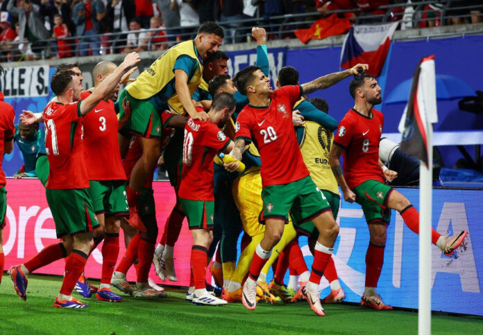 Portugal’s Francisco Conceicao celebrates scoring their second goal with teammates. | Photo Credit: Reuters