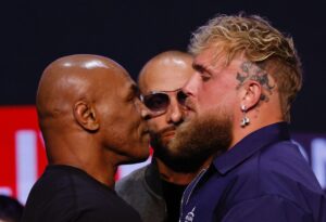 (FILES) Former US boxer Mike Tyson (L) and YouTuber Jake Paul face off during a press conference at the Apollo Theatre in New York, on May 13, 2024.  (Photo by Kena Betancur / AFP)