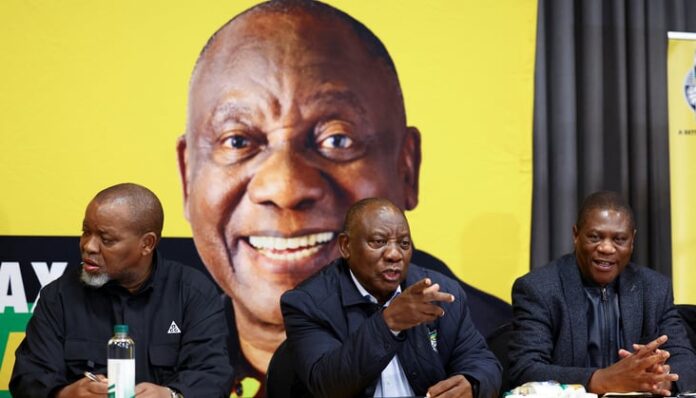 South African President Cyril Ramaphosa (c) with ANC party National Executive Committee members Deputy President Paul Mashatile and Gwede Mantashe, Boksburg,South Africa, 6 June 2024. (Reuters/Siphiwe Sibeko)