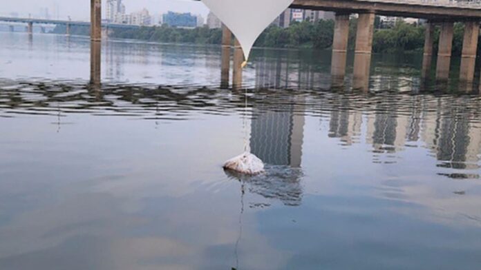 This photo provided by South Korea's Joint Chiefs of Staff and released by South Korea Defense Ministry, shows a balloon presumably sent by North Korea, on the Han River in Seoul, South Korea, Sunday, June 9, 2024. (AP)