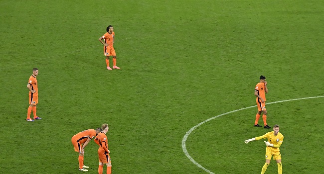 Netherlands’ players react after conceding a second goal during the UEFA Euro 2024 semi-final football match between the Netherlands and England at the BVB Stadion in Dortmund on July 10, 2024. (Photo by INA FASSBENDER / AFP)