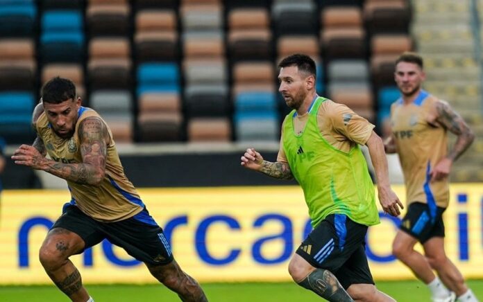 Argentina players warm up during a training session one day before the Conmebol 2024 Copa America tournament quarterfinal between Argentina and Ecuador at Shell Energy Stadium in Houston, Texas.