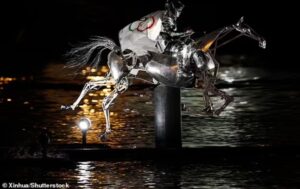 A dramatic end to the ceremony saw a mechanical horse and rider gallop up the Seine