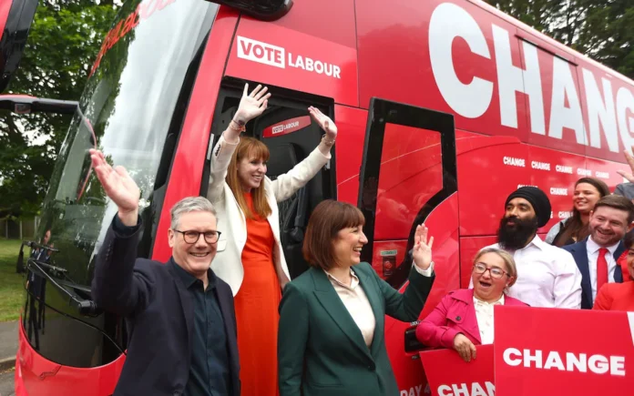 Sir Keir Starmer, Angela Rayner, the deputy Labour leader, centre, and Rachel Reeves, the shadow chancellor, take the battle bus to Uxbridge in west London CREDIT: Peter Nicholls/Getty