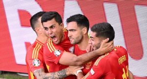 Spain’s midfielder #06 Mikel Merino (2nd R) celebrates scoring his team’s second goal with teammates during the UEFA Euro 2024 quarter-final football match between Spain and Germany at the Stuttgart Arena in Stuttgart on July 5, 2024. (Photo by Kirill KUDRYAVTSEV / AFP)